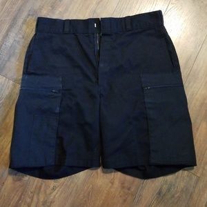 Black Dickies cargo shorts.